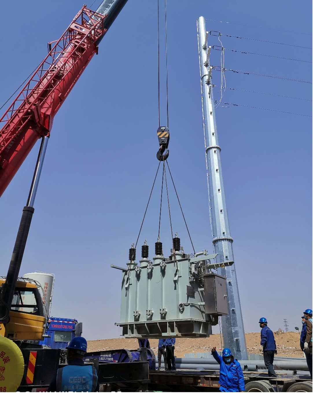 1587099274866736RJZf.jpg 國源公司榆林生活垃圾發(fā)電項目主變壓器成功就位 (1).jpg